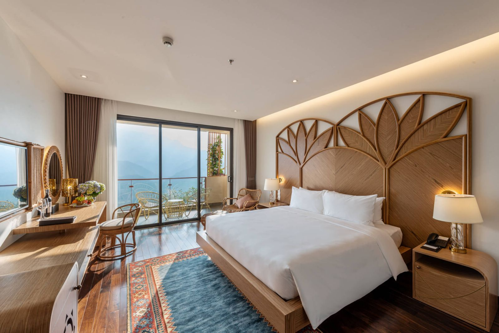 Phòng nghỉ ấm cúng và hướng núi tại KK Sapa Hotel