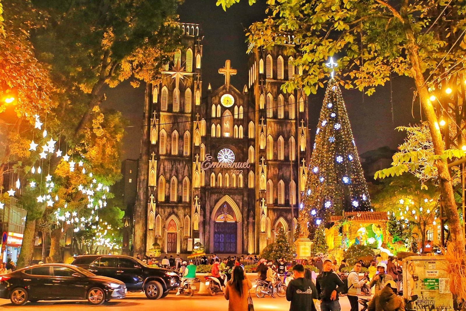 Hanoi’s cathedral is illuminated with festive lights during Christmas