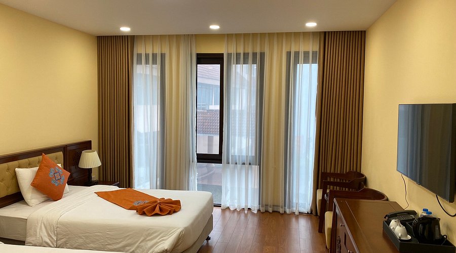 Phòng ngủ tiện nghi và ấm cúng tại Sapa Green Forest Hotel.