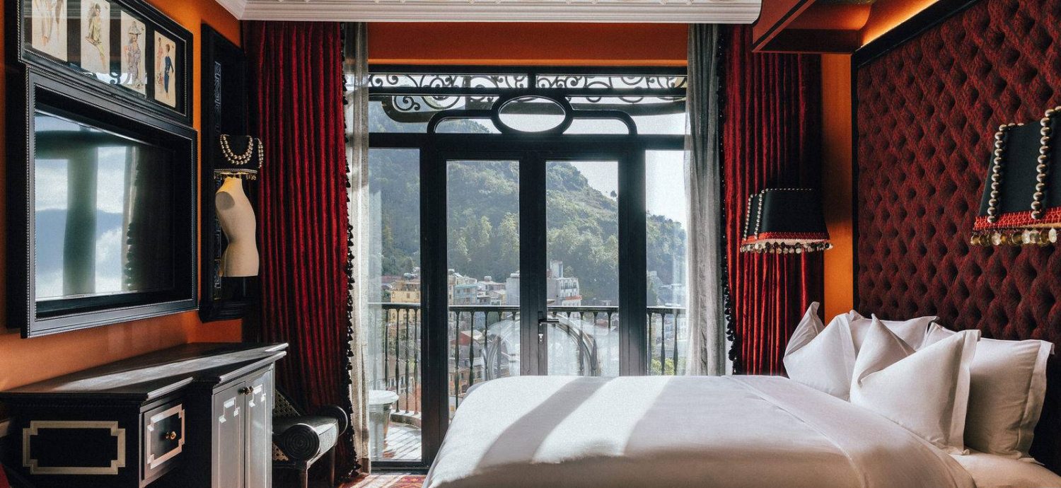 Phòng Deluxe Suite với thiết kế sang trọng, ấm cúng. 